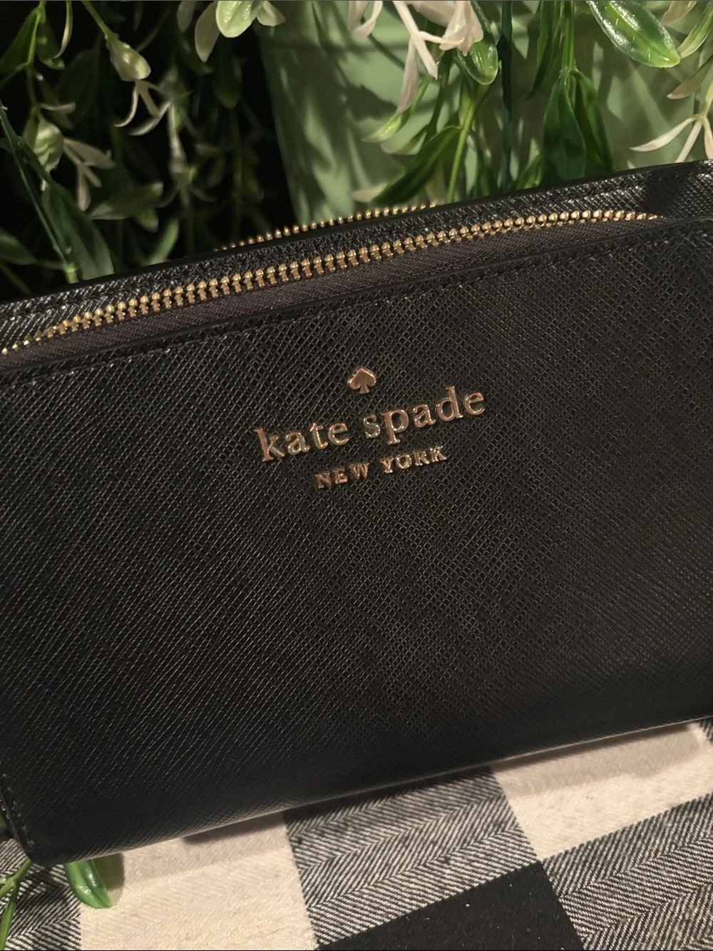 kate spade black saffiano leather zip-around wallet with gold logo